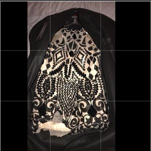 This is a fit for a queen dress, worn only once.